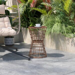 Accessorize your indoor and outdoor decor and gain some much needed horizontal real estate with this boho rattan rope side table. The hourglass shape is pleasing to the eye and the round frame softens straight lines and gives a balanced