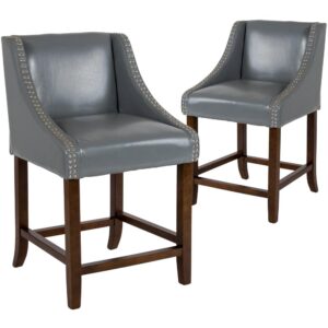 Bring warmth and comfort to your home while adding some world class elegance with this set of 2 classically sophisticated light gray counter stools. Have breakfast at your kitchen island or hang out with friends around the dining room table in style. Boasting soft and durable LeatherSoft upholstery paired with decorative nail head trim
