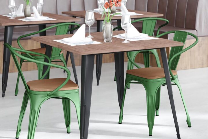 Spice up your kitchen or dining room by adding this colorful black metal chair with a long-lasting poly resin seat to your space. Whether your space is shabby chic