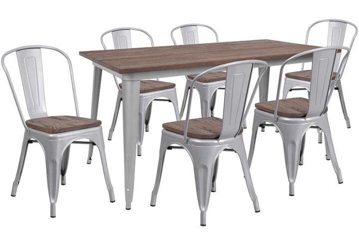 The trendy metal dining table with stack chairs will give your dining room or bar decor a refreshing rustic feel with its wood features. The table has a shiny metal frame that is topped off with an appealing textured wood top. The stackable bistro style chairs feature curved backs with a vertical slat and a cross brace under the seat for added support and stability. Plastic bumpers on the cross brace protect the chairs' finish from scratches when stacking them and rubber floor glides protect your floor by sliding smoothly when you need to move them. Designed for both commercial and residential use