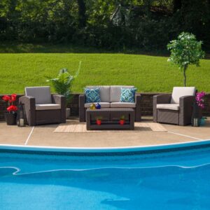 Surround yourself with loved ones and make those memories that last forever on this beautiful chocolate brown outdoor seating ensemble. The durable resin frame offers a stylish appearance which replicates rattan. Deep seating enhances the comfort level. Beige all-weather cushions will hold up all season long. Clean up spills with a water-based cleaner or the cushions are zipper removable for washing purposes when spot cleaning just isn't enough. The table features a lower shelf for storage of your dining or relaxing essentials so just relax and let your worries go.