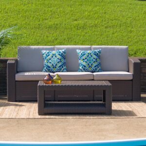 Create an amazing outdoor space with this comfortable and stylish chocolate brown patio sofa. The durable resin frame offers a stylish appearance which replicates rattan. Deep seating enhances the comfort level. Beige all-weather cushions will hold up all season long. Clean spills with a water-based cleaner or the cushions are zipper removable for washing purposes. Curl up with your latest read
