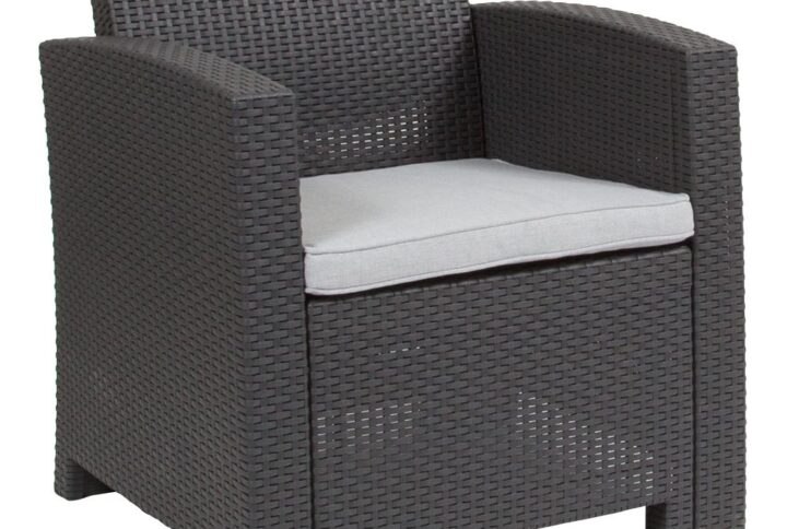 Create an amazing outdoor space with this comfortable and stylish dark gray patio chair. The durable resin frame offers a stylish appearance which replicates rattan. Deep seating enhances the comfort level. Light gray all-weather cushions will hold up all season long. Clean spills with a water-based cleaner or the cushions are zipper removable for washing purposes. Curl up with your latest read