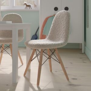 Update the look of your child's bedroom or playroom and give them a cozy place to sit with this faux sherpa upholstered scoop style chair. Whether you're moving into a new home or just want to give your "big kid" upgraded seating