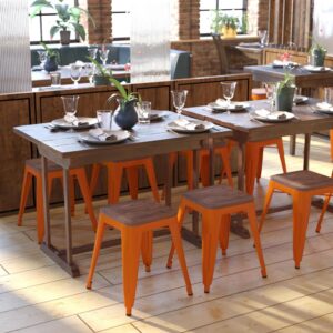 Give your kitchen or dining room an instant revamp when you choose the on-trend square shape of this set of 4 indoor metal kitchen table height stools with wooden seats. The streamlined silhouette of this short bar stool allows it to tuck under your dining room