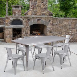 The indoor-outdoor rectangular metal table with six arm chairs will give your dining room or restaurant a cool retro-vintage look. The table top measures 31.5 inches wide by 63 inches long and has a smooth top with a 1 inch edge. A stabilizing brace underneath the top gives this table increased stability while still allowing ample leg room. The cafe style arm chairs feature curved backs with a vertical slat