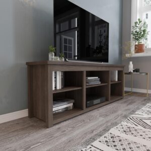 Simple lines and minimalist style abound in this TV stand for up to 80" TV's. Open concept storage and a cord management port are ideal for displaying the newest electronics and family mementos while keeping everything neat and tidy. The updated look of this media center would be a great addition to your new home or would give an instant upgrade to your current space. Mounting your television on the wall above this entertainment center will open up great design possibilities. Additional electronics like gaming consoles and soundbars will fit neatly on the top shelf while decor items can tuck into any of the 6 compartments. The 65 inch top supports 200 Lbs. static weight capacity while the height adjustable shelves hold up to 30 Lbs. to accommodate your display items.  Step-by-step illustrated instructions or online PDF allow you to assemble this TV console in under an hour. Fixed plastic floor glides protect your hard flooring surfaces from scuffs and scratches if bumped into. Furniture mover pads can be purchased to help move this unit with minimal effort. Wipe clean with water and dry cloth to keep this storage cabinet looking new.