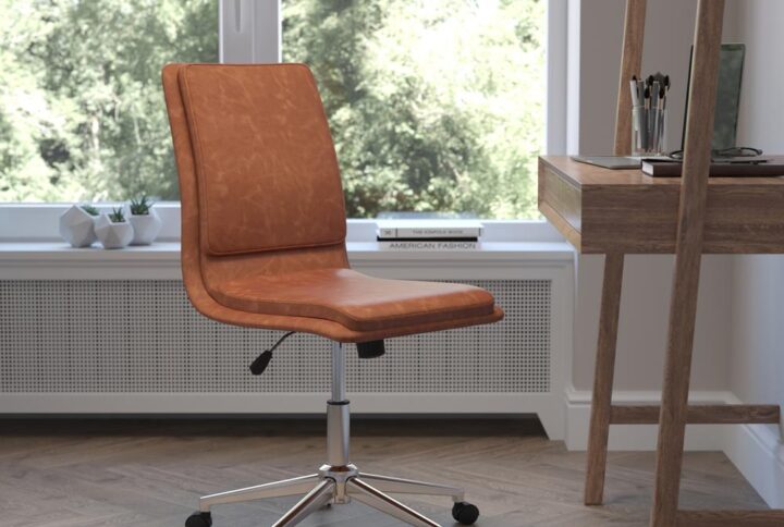 Fabulous form meets practical purpose in the elevated style of this mid-back office task chair. Plush foam padding in the back and seat is enveloped in luxurious LeatherSoft upholstery for an upmarket look in a commercial workplace or home office. LeatherSoft is leather and polyurethane for added softness and durability. The space-saving