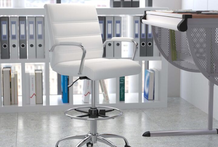 Be comfortable and stylish whether you're working at your desk or higher surfaces with this height adjustable drafting chair. Covered in soft and durable white LeatherSoft upholstery with ribbed stitching