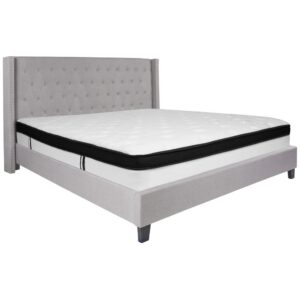 this luxurious platform bed will keep you in awe every time you walk into your bedroom. This complete set includes your king sized bed frame and hybrid pocket spring and memory foam mattress in a box. This beauty is adorned by nailhead trimming on the protruding sides and has a button tufted panel headboard. The headboard has ample height to prop yourself up against it while the low set frame still provides an open appeal that you seek out when looking at platform beds. The mattress sits atop 45 wooden support slats. The 12" memory foam and pocket spring mattress provides superior motion isolation and supports the contours of your body. The hybrid mattress consists of pocket spring coils and two layers of memory foam padding that provide a barrier between the springs for easy resting. The foam is CertiPUR-US Certified so it's free from heavy metals