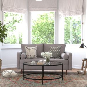 Refresh the look of your current home or furnish your new residence with the trendy mid-century modern aesthetic of this compact loveseat ideal for small spaces. Upholstered in commercial grade faux linen fabric and boasting buttonless tufting on the seat cushion
