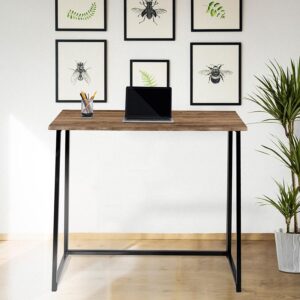 Get into a normal work from home routine by setting up a dedicated office space to perform your work duties instead of the dining room table. When you need something simple and functional this folding computer desk is at your service. Setup your desktop or use as a laptop table. If you're short on space this foldable desk folds to 2.75" depth to store behind your sofa. This attractive industrial style desk is highlighted by light and dark colored variations. Create a school environment at home for your remote learning student. This student desk can be used in the home or dorm room. The industrial style desk can be your all-in-one creative space for work