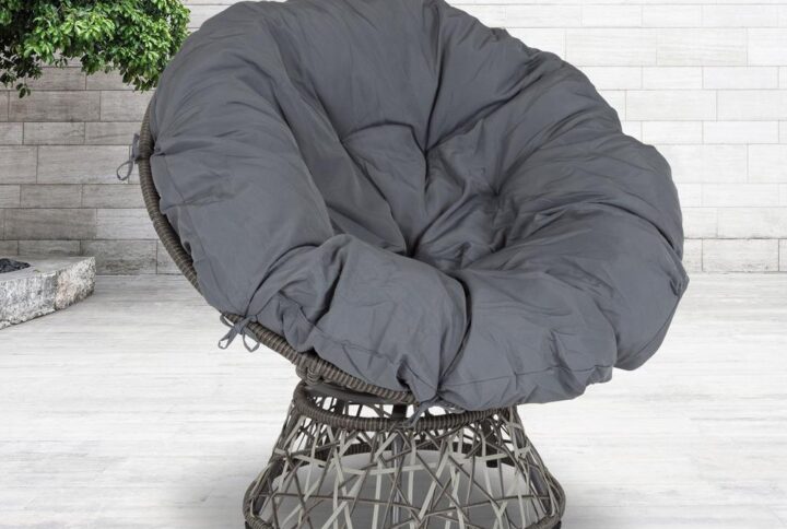 Kick back and relax on this swivel patio chair with a comfy gray cushion that is sure to ease the stresses of the day. The bowl-shaped design with its plush cushion allow you to sink into comfort to catch up on a good book