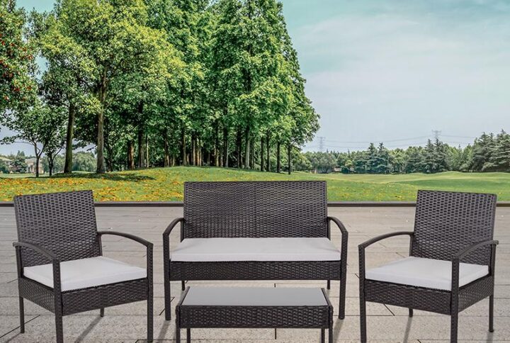 This stylish black four piece grouping with its gray all-weather cushions includes a loveseat