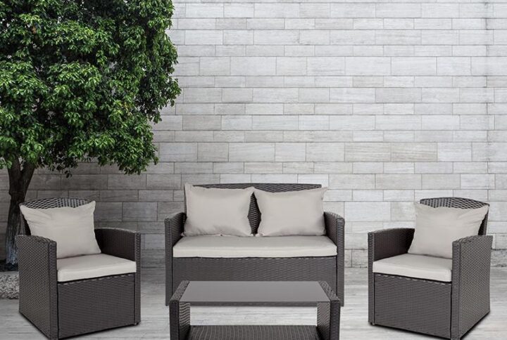 This cozy black seating group is essential to any outdoor space. It is an invitation to relax and unwind in comfort on gray weather resistant cushions crafted for durability. This ensemble features a loveseat