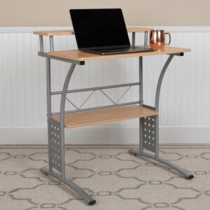offering an efficient workstation that fits well in small spaces. The generous desk surface is made from maple laminate with a raised top shelf for your monitor and a lower bottom shelf for your hard-drive and other supplies. The two shelf desk has a modern silver