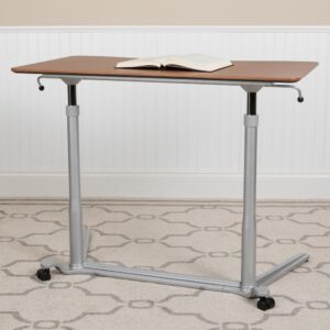 your office desk. This ergonomic standing desk gives you the option to not only work in a seated position but also while standing. We all know that sitting for hours is an unhealthy practice