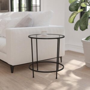 polished look with this round clear glass end table with matte black steel legs. This living room end table successfully marries the beauty of glass with the strength of steel that makes a definite statement. The round top and frame contrast with the vertical legs to provide a contemporary look that's sure to tie any trendy room's presentation together. Whether you have a spacious modern home or a one bedroom apartment this round end table will fit right in. The round design is perfect for an L-shaped sectional in the living room