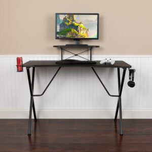 this game station has a cup holder to prevent accidental spills. The multi-function workstation powers you through game sessions and work demands on a sturdy x-shape frame. Reduce neck strain by placing the monitor on the platform. Always know where your headset is by placing on the headset hook in between games. A cable management grommet offers a clutter-free location to feed cords. Upgrade the gamer or salesman in your home or office with this computer gaming desk. Complete your gaming setup with our Gaming Chair Racing Office Ergonomic Computer PC Chairs.