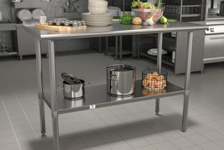 Give yourself some extra space for catering parties or setting up the buffet line at your eatery or bistro and increase functionality in your busy restaurant kitchen with this commercial kitchen prep and work table with adjustable undershelf and backsplash. This steel commercial work table is a great space for bulk food preparation for businesses such as daycares