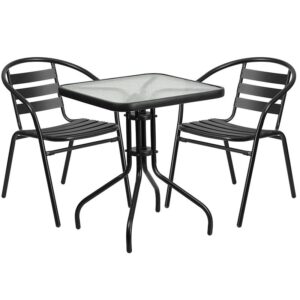 this square table and 2 chair set is just what you need. The table's rippled designer glass top has a smooth surface for keeping items level. The lightweight chairs feature a curved aluminum triple slat back