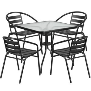 this square table and 4 chair set is just what you need. The table's rippled designer glass top has a smooth surface for keeping items level. The lightweight chairs feature a curved aluminum triple slat back