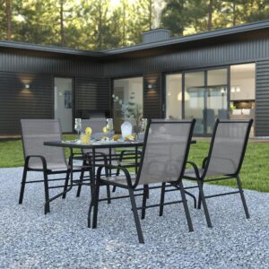 but is smooth to the touch to keep items level. The black metal base and frame provide a striking contrast to the glass top for an on-trend look. The overall design is enhanced by the ergonomic sling patio chairs that have breathable
