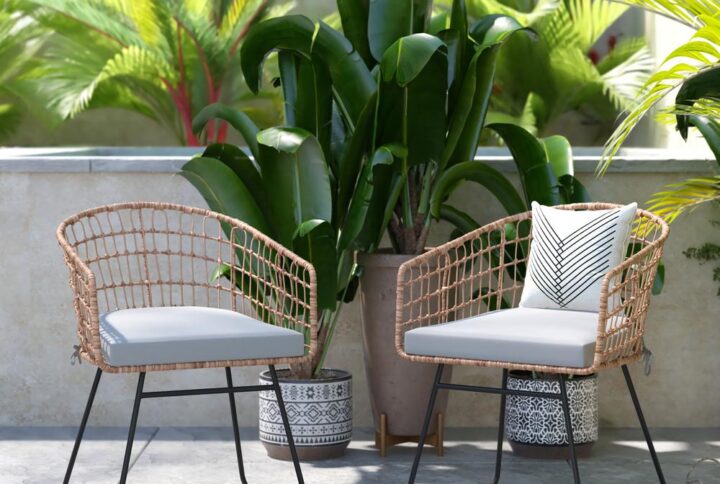 Sunny afternoons on the deck or rainy days in the sunroom are much more enjoyable in this set of 2 rattan rope club chairs with plush seat cushions. Gently rounded backs paired with super sturdy metal sled bases give these accent chairs a trendy