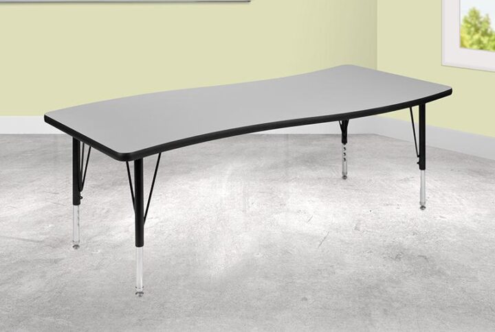 Develop young kids social skills with collaborative wave activity tables that encourages working together. Wave classroom tables instantly modernizes your classroom to bring excitement to the learning environment. Nest two or more activity tables together as your groups become larger. Built to last through many class turnovers the thermal fused laminate top is scratch