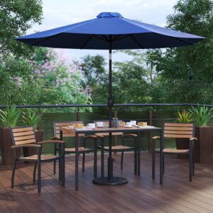 shady spot for dining or relaxing at your home or business is in this 7 piece patio set. Patrons love to dine al fresco and this all-weather dining set won't disappoint. The trending natural colored synthetic faux teak slats contrast beautifully with the black metal frames and blend seamlessly in almost any decor. The included tan polyester umbrella with base will protect your electronics and pets from overheating. Entertain guests at your home or restaurant with this on-trend outdoor seating bundle. The 18 gauge steel frame of the patio table features metal screw construction that holds up to 300 Lbs. static weight capacity to effortlessly hold your favorite dishes while the 12 gauge aluminum patio chairs stack up to 15 high for storage or cleaning. The 30+ UV treated polyester umbrella boasts push button tilt to keep you shaded no matter where the sun is. Powder coating on the dining table