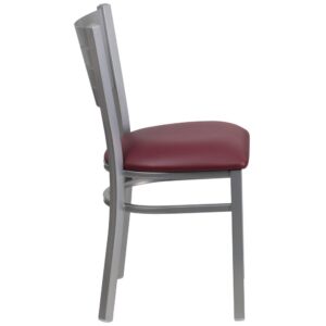 coffee house or dining room. This metal chair has a slat back design