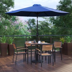 shady spot for dining or relaxing at your home or business is in this 7 piece patio set. Patrons love to dine al fresco and this all-weather dining set won't disappoint. The trending natural colored synthetic faux teak slats contrast beautifully with the black metal frames and blend seamlessly in almost any decor. The included navy polyester umbrella with base will protect your electronics and pets from overheating. Entertain guests at your home or restaurant with this on-trend outdoor seating bundle. The 18 gauge steel frame of the patio table features metal screw construction that holds up to 300 Lbs. static weight capacity to effortlessly hold your favorite dishes while the 12 gauge aluminum patio chairs stack up to 27 high for storage or cleaning. The 30+ UV treated polyester umbrella boasts push button tilt to keep you shaded no matter where the sun is. Powder coating on the dining table