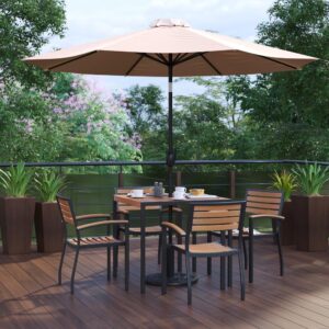 shady spot for dining or relaxing at your home or business is in this 7 piece patio set. Patrons love to dine al fresco and this all-weather dining set won't disappoint. The trending natural colored synthetic faux teak slats contrast beautifully with the black metal frames and blend seamlessly in almost any decor. The included tan polyester umbrella with base will protect your electronics and pets from overheating. Entertain guests at your home or restaurant with this on-trend outdoor seating bundle. The 18 gauge steel frame of the patio table features metal screw construction that holds up to 300 Lbs. static weight capacity to effortlessly hold your favorite dishes while the 12 gauge aluminum patio chairs stack up to 27 high for storage or cleaning. The 30+ UV treated polyester umbrella boasts push button tilt to keep you shaded no matter where the sun is. Powder coating on the dining table