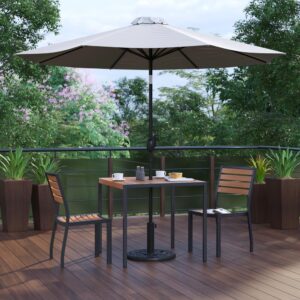and weatherproof base keep you cool. The trending natural colored synthetic faux teak slats contrast beautifully with the black metal frames and look great in any space. The 18 gauge steel frame of the patio table and aluminum frame of the patio chairs hold up to 300 Lbs. static weight capacity. The 9ft market umbrella boasts push button tilt. Powder coated frames resist nicks and scratches and are weather-resistant though care should be taken to protect from prolonged wet weather. Assembly for all pieces takes less than 30 minutes. Your new set wipes clean with a water based cleaner. Fixed glides maintain the appearance of your hard flooring surfaces when used indoors.