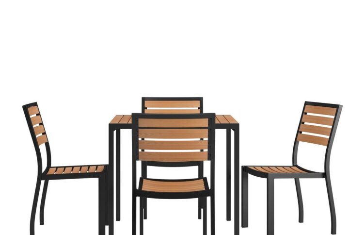 Spend more time outdoors when you add this 5 piece patio table and chair set to your patio