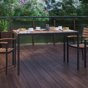 and this all-weather dining table comfortably seats up to 4 adults. Trending natural colored synthetic faux teak slats contrast beautifully with the black metal frame and blend seamlessly in almost any decor. Pick the umbrella that suits your personal taste and insert it into the umbrella holder hole to remain cool while outside. Entertain guests at home or your neighborhood restaurant with this no-stress table. The 18 gauge steel frame features metal screw construction that holds up to 300 lbs. static weight capacity to effortlessly hold your favorite dishes. Powder coating helps resist nicks and scratches and is weather-resistant for year-round use though care should be taken to protect from prolonged periods of wet weather. The faux teak poly slatted top won't peel