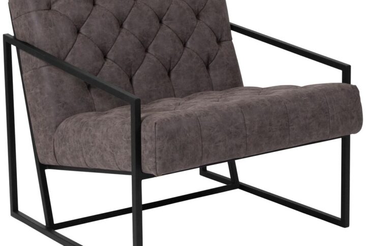 Transform your space and give visitors to your home or business something visually stimulating with this unique lounge chair. This versatile chair boasts an integrated frame that not only acts as an accent piece but also features slanted arms. The tufted back and seat done in light gray LeatherSoft upholstery give this piece a retro look that your clients and guests will notice. LeatherSoft is leather and polyurethane for added softness and durability. Set a trend with this cozy lounge chair that will be just as at stunning in your home as an accent chair as it is in your reception area.