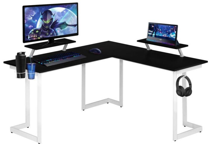 Elevate the productivity of your game with our Techni Sport Warrior L-shaped gaming desk. Maximize your floor space while being multitasking.  It features two cup holders and headphone holder