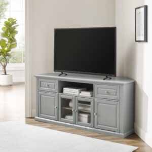 The 60” Corner TV Stand accommodates most flat-panel TVs up to 65-inches and tucks neatly into any corner of your home. Two cabinets have raised panel doors for concealed storage