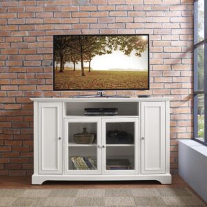 this TV stand accommodates most flat-panel TVs up to 65-inches. Two tall cabinets with raised panel doors offer customizable storage thanks to their adjustable shelving. At the center of the stand