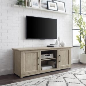 Gather together for a family movie night with the Camden 58” Low Profile TV Stand. This TV stand features two cabinets with an adjustable shelf in each