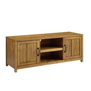 The Roots TV Stand offers industrial inspired style and storage. The stand includes two side cabinets with adjustable shelves and one exposed middle shelf. The finely crafted solid hardwood and wood veneers are hand finished