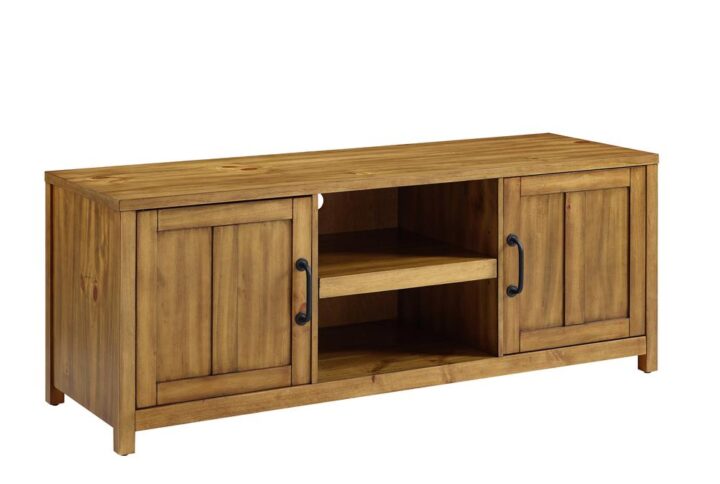The Roots TV Stand offers industrial inspired style and storage. The stand includes two side cabinets with adjustable shelves and one exposed middle shelf. The finely crafted solid hardwood and wood veneers are hand finished