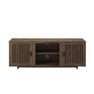 this entertainment center brings mid-century vibes wherever it goes. With adjustable shelving in the cabinets and center compartment