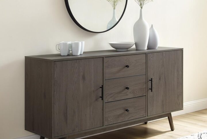 The Lucas Sideboard showcases mid-century modern design at its best. Featuring two spacious cabinets with adjustable shelves