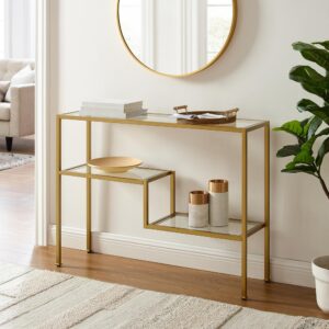 this console table's sculptural steel frame features sturdy tempered glass shelves. Variable shelf heights create a geometric design with Art Deco flair