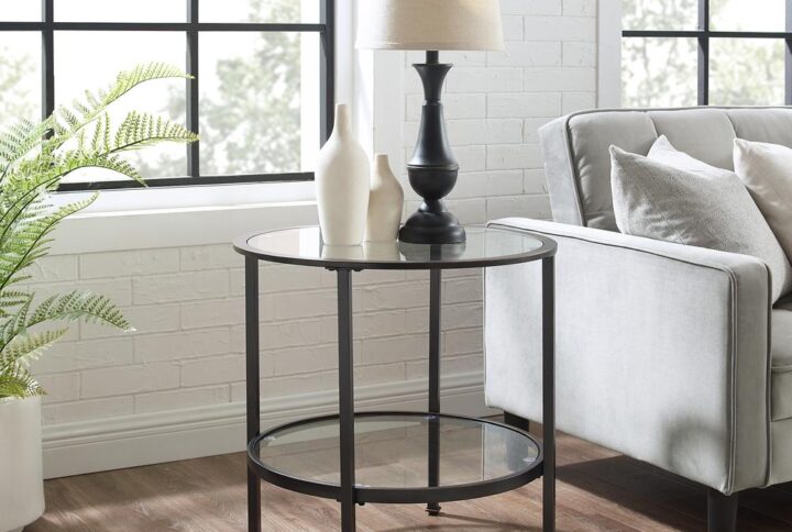 The Aimee End Table brings a stylish and modern edge to any home. With a sturdy yet sleek steel frame