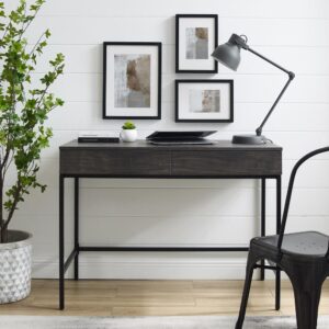 the sleek profile of the Jacobson Desk is a welcome addition to your home office. The streamlined industrial look of the desk combines sturdy steel with the look of rich wood. But