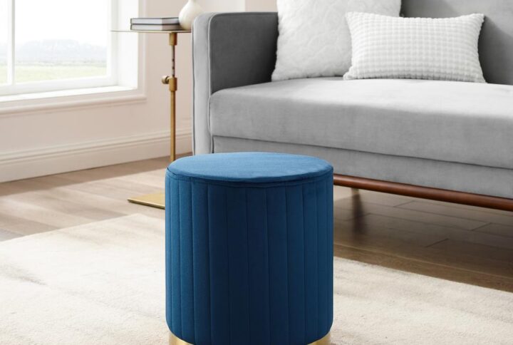 Add a touch of glam to any room with the Sabrina Pouf Ottoman. Channel tufted in decadent velvet with a gold metal base