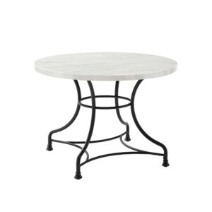 the Madeleine Dining Table brings stylish café dining to your home. The faux marble tabletop creates an upscale look while the steel base adds a French industrial aesthetic. The open pedestal design of the table base forms an elegant profile and provides comfortable seating for up to four diners.